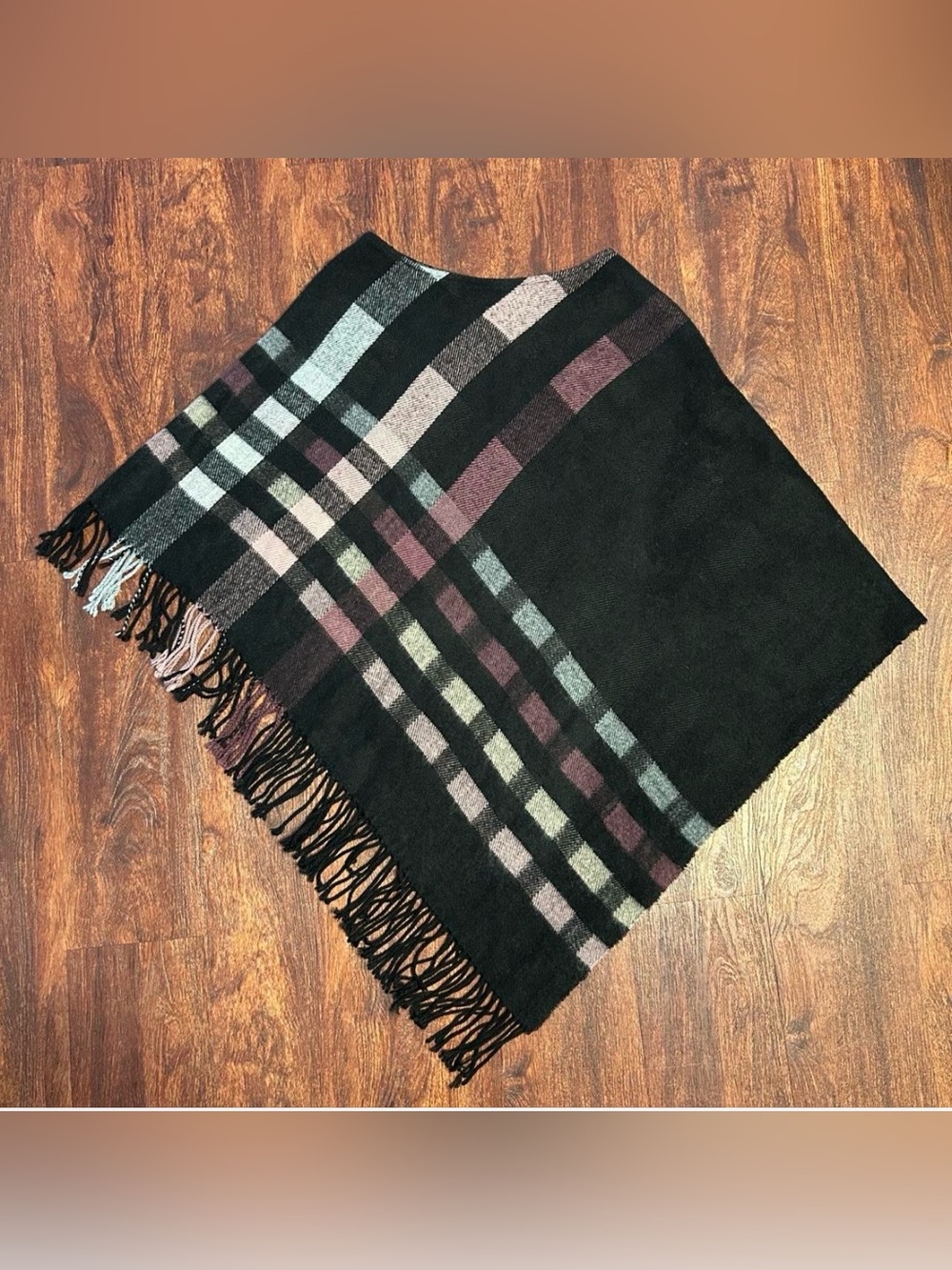 Plaid sweater poncho with fringe